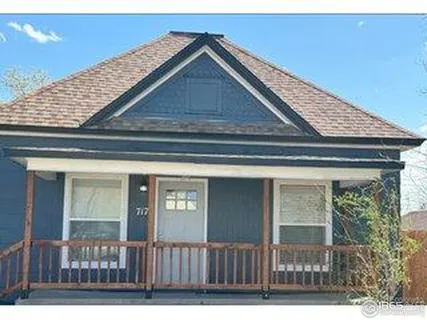a large bathroom with a sink and a large mirror
