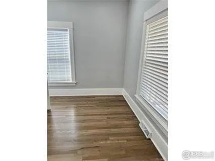 a view of a house with a yard and garage