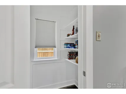 a bathroom with a sink vanity granite and a mirror