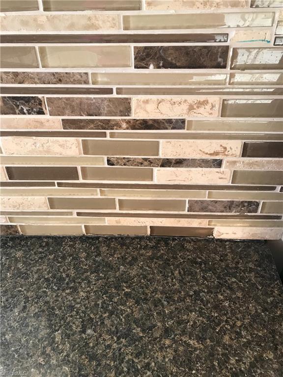 371 Sunset Ridge Lane Lexington, NC 27295 - Photo 8 of 21 New kitchen counters. Tile backsplash.