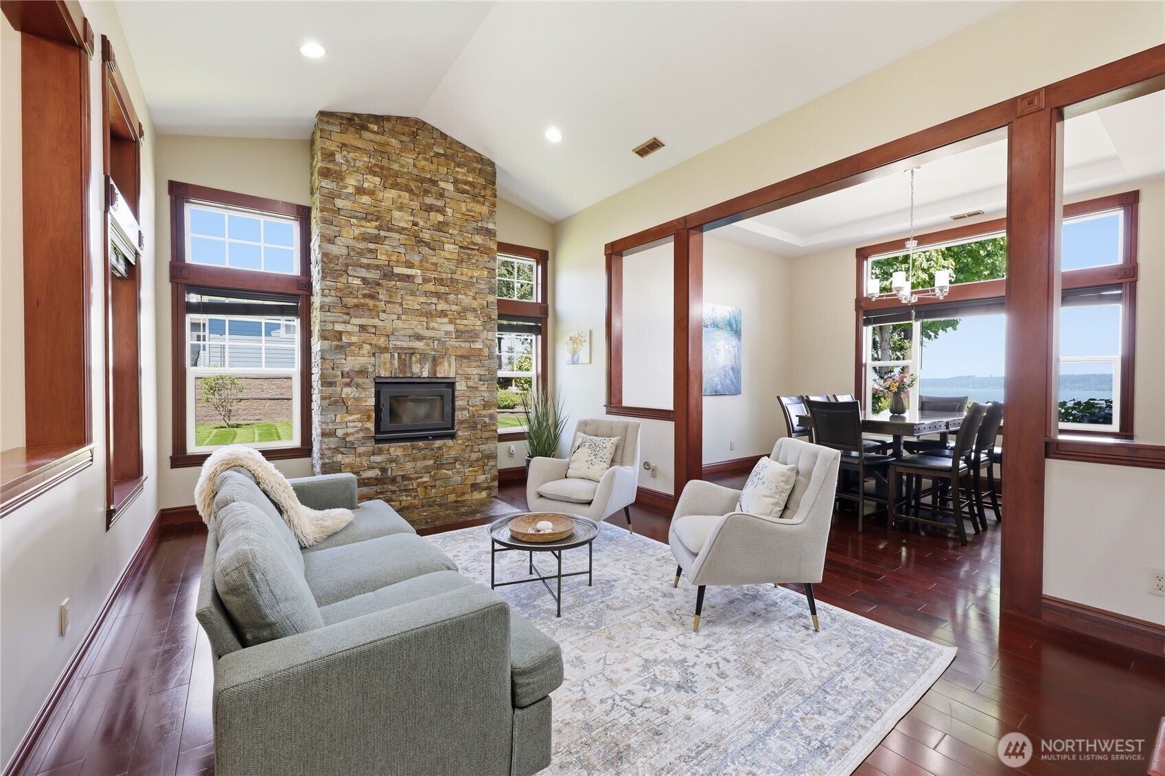 1411 Thorndyke Road Port Ludlow, WA 98365 - Photo 10 of 40 a living room with furniture and a fireplace