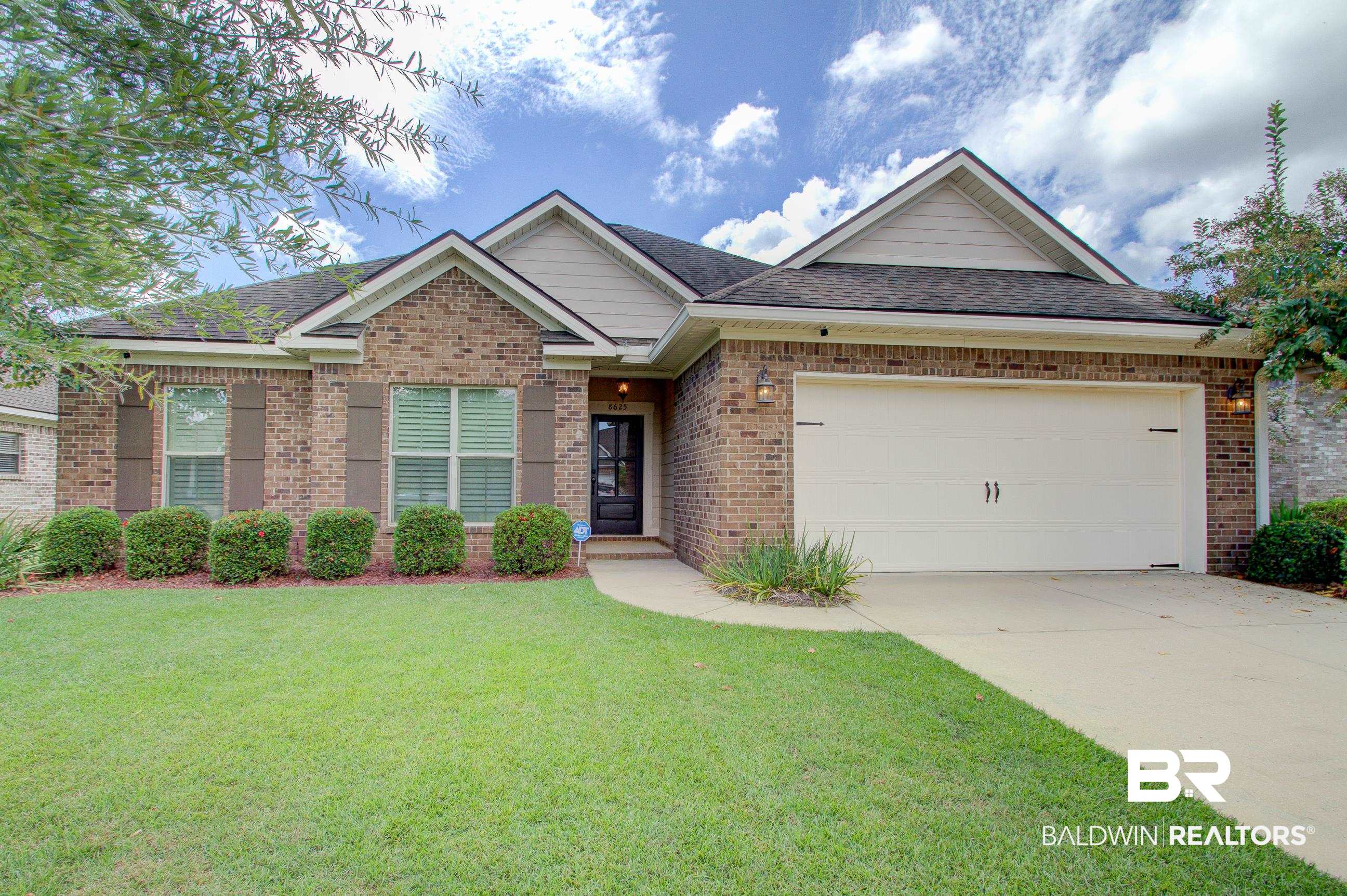 8625 Rosedown Lane Daphne, AL 36526 - Photo 2 of 29 View of front facade featuring a garage and a front lawn