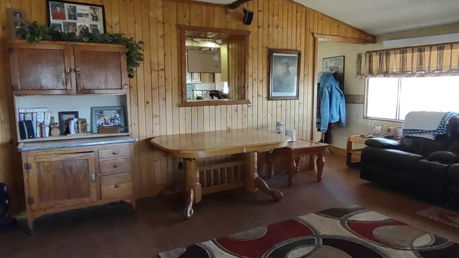 3465 G Road Clifton, CO 81520 - Photo 3 of 18 a living room with furniture a window and a table
