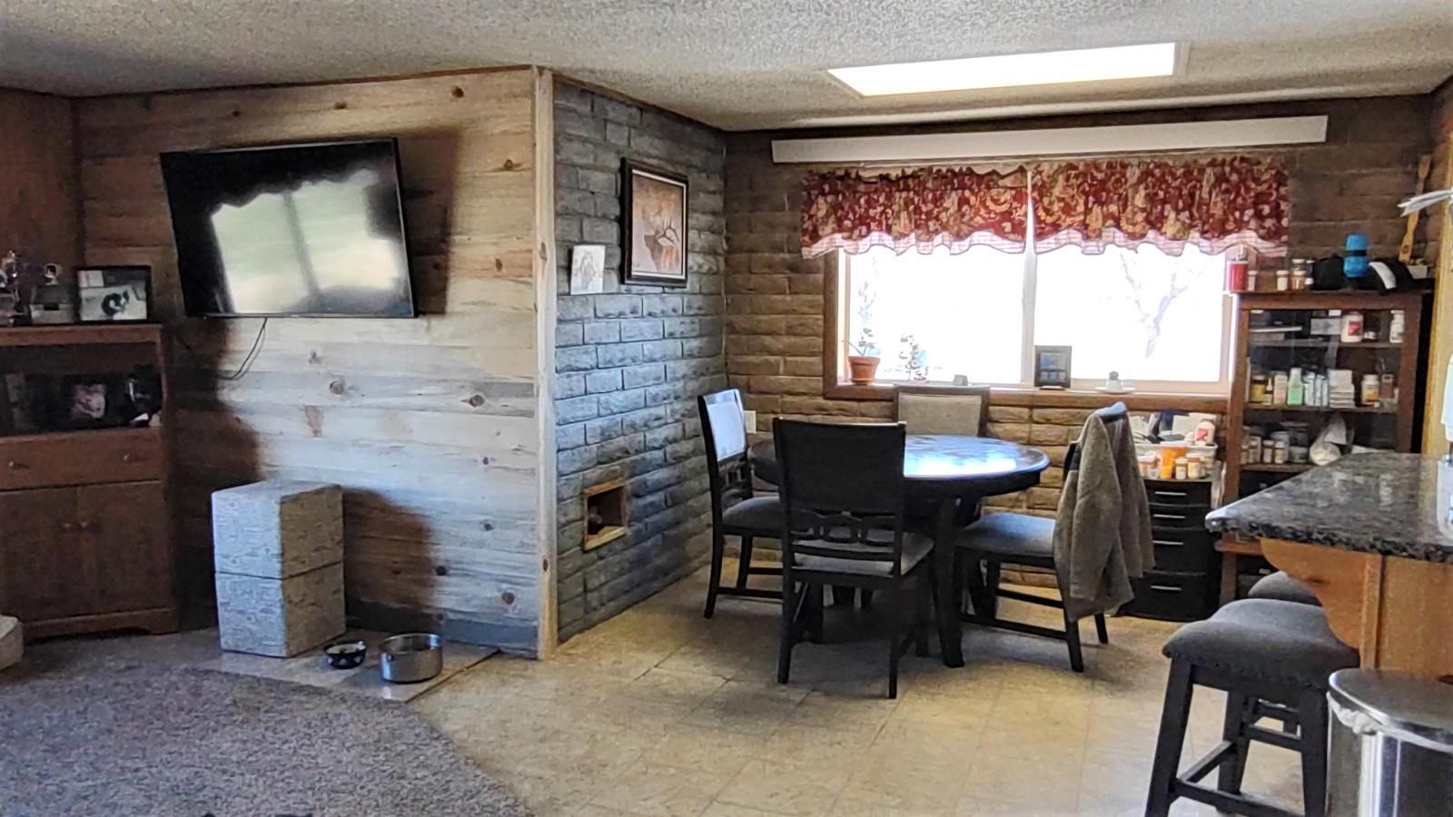 3465 G Road Clifton, CO 81520 - Photo 5 of 18 a view of a room with a table and chairs