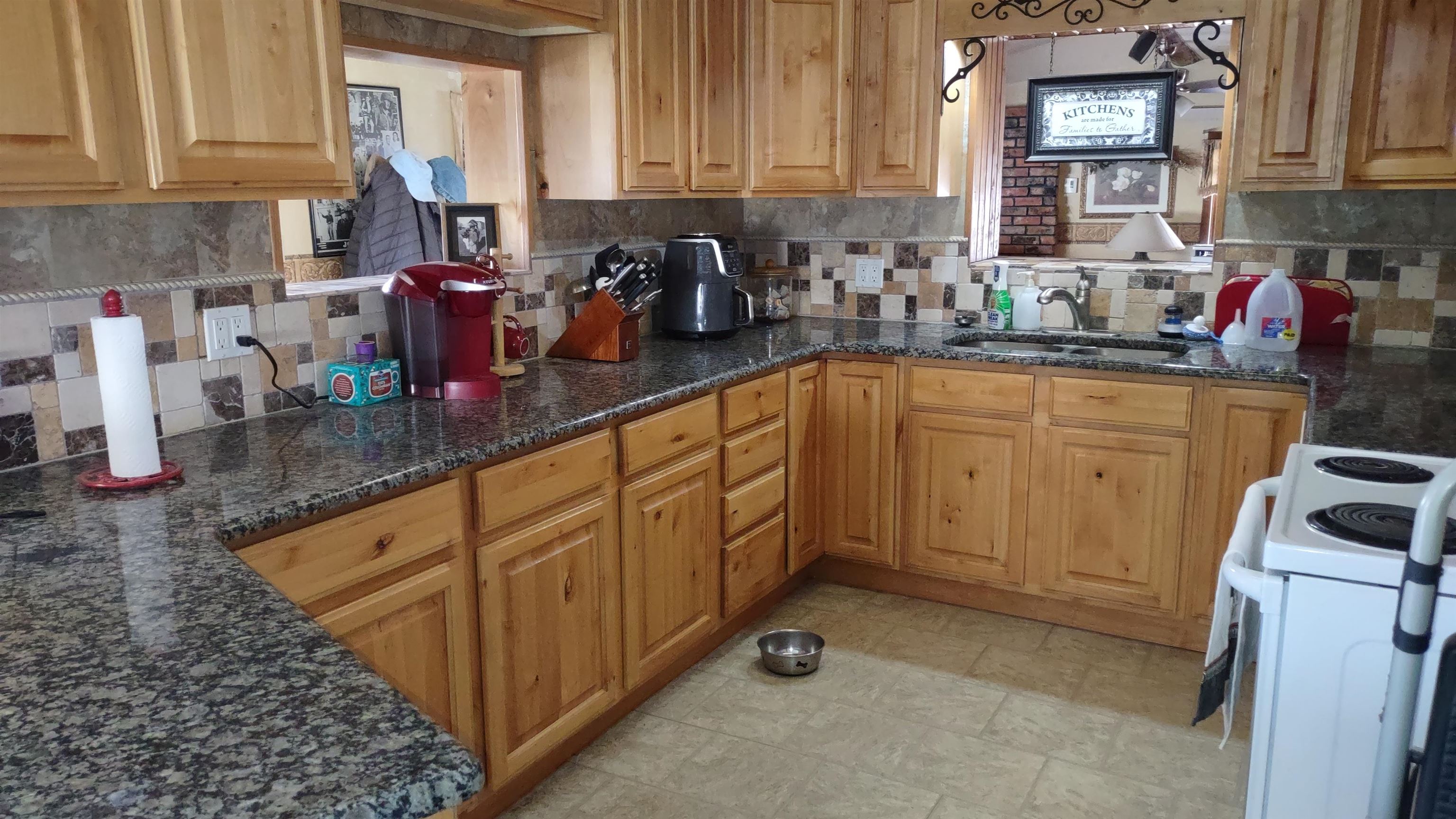 3465 G Road Clifton, CO 81520 - Photo 7 of 18 a kitchen with sink cabinets and window