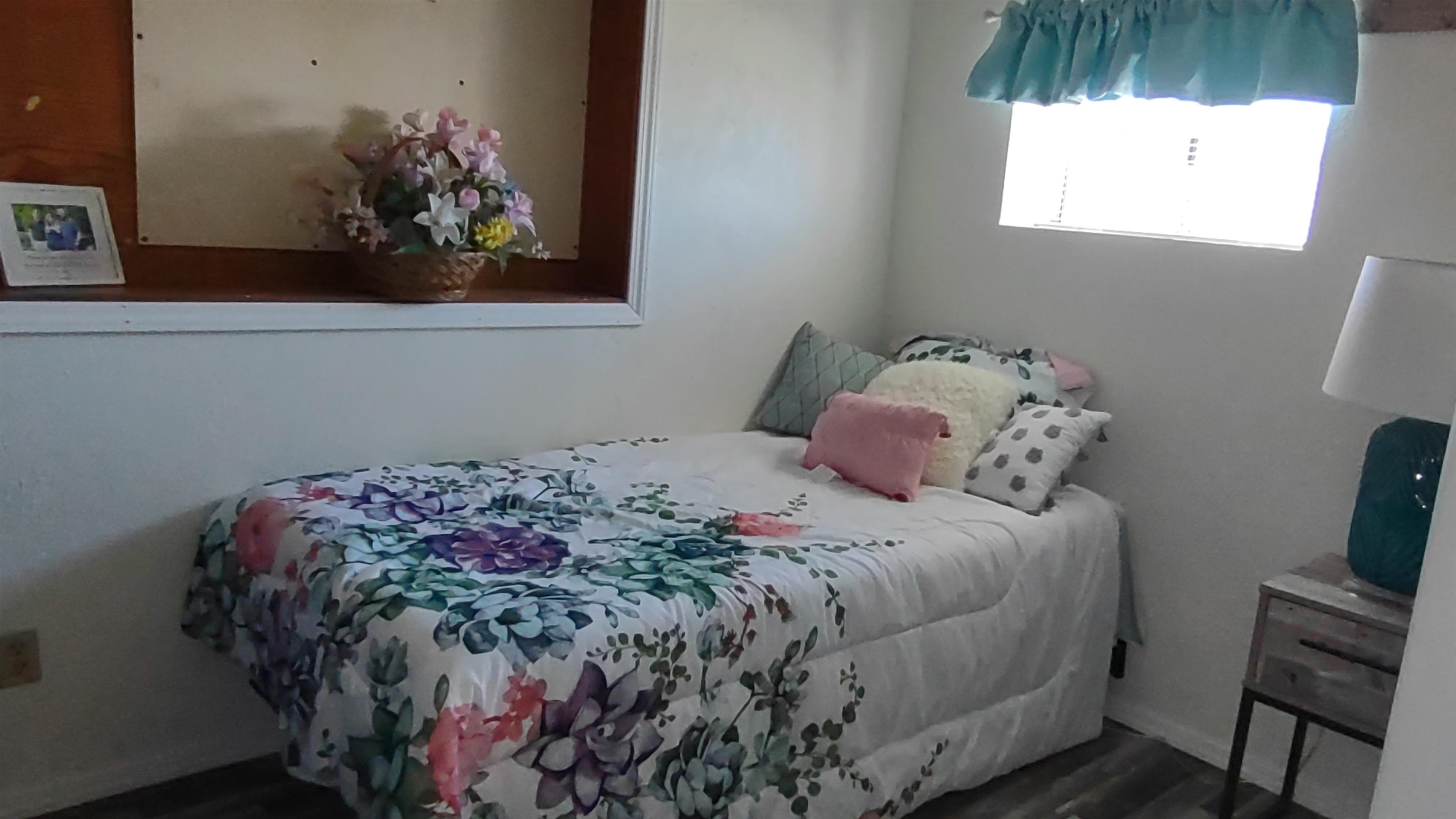 3465 G Road Clifton, CO 81520 - Photo 9 of 18 a bedroom with a bed and a window