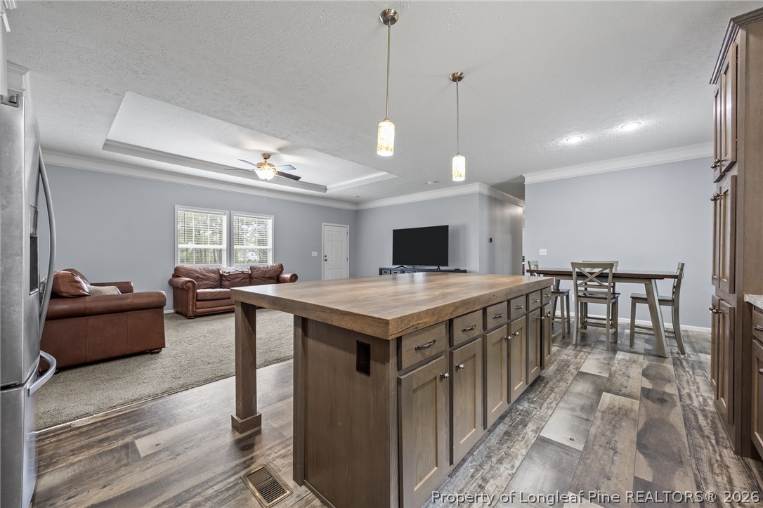 2252 Old Stage Road South Erwin, NC 28339 - Photo 7 of 47 a kitchen with a stove a counter top space and wooden floor