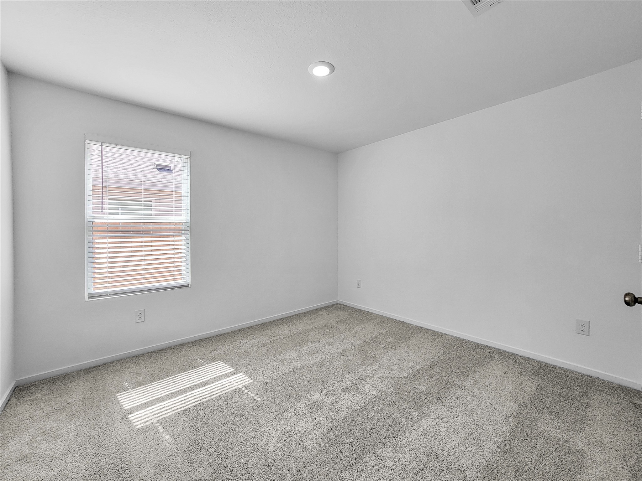 14611 North Ascot Bnd Circle Conroe, TX 77306 - Photo 7 of 16 an empty room with a window