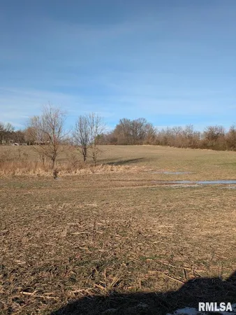 a view of an ocean from a mountain