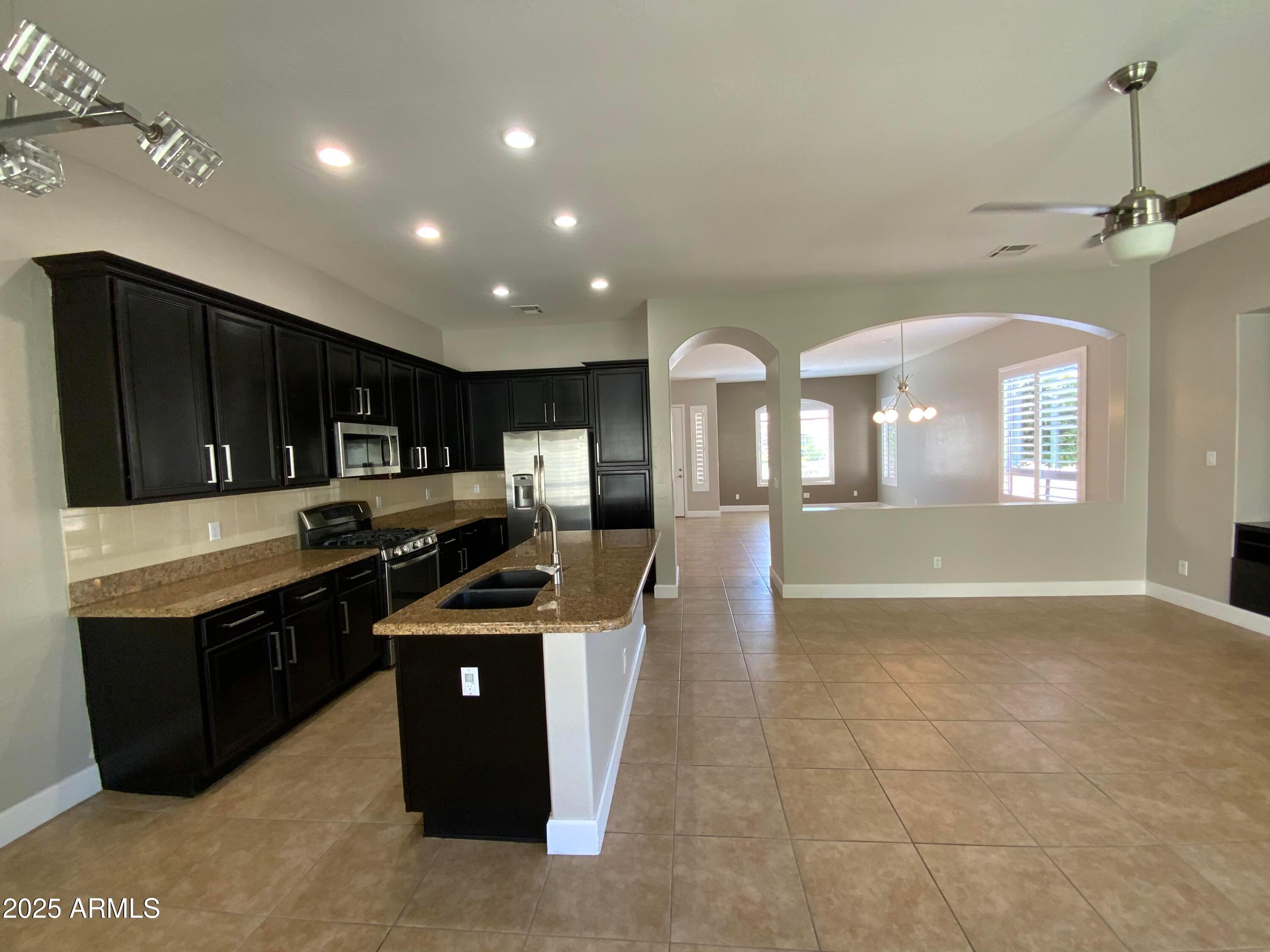 6204 East Phelps Road Scottsdale, AZ 85254 - Photo 8 of 25 a kitchen with lots of counter top space