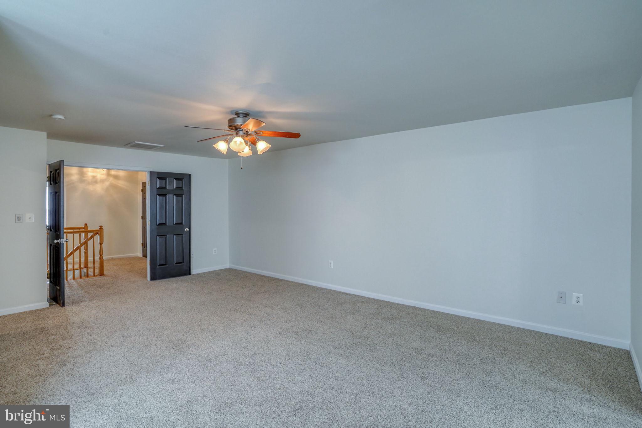 305 Appleby School Road Cambridge, MD 21613 - Photo 32 of 53 a view of an empty room with a window