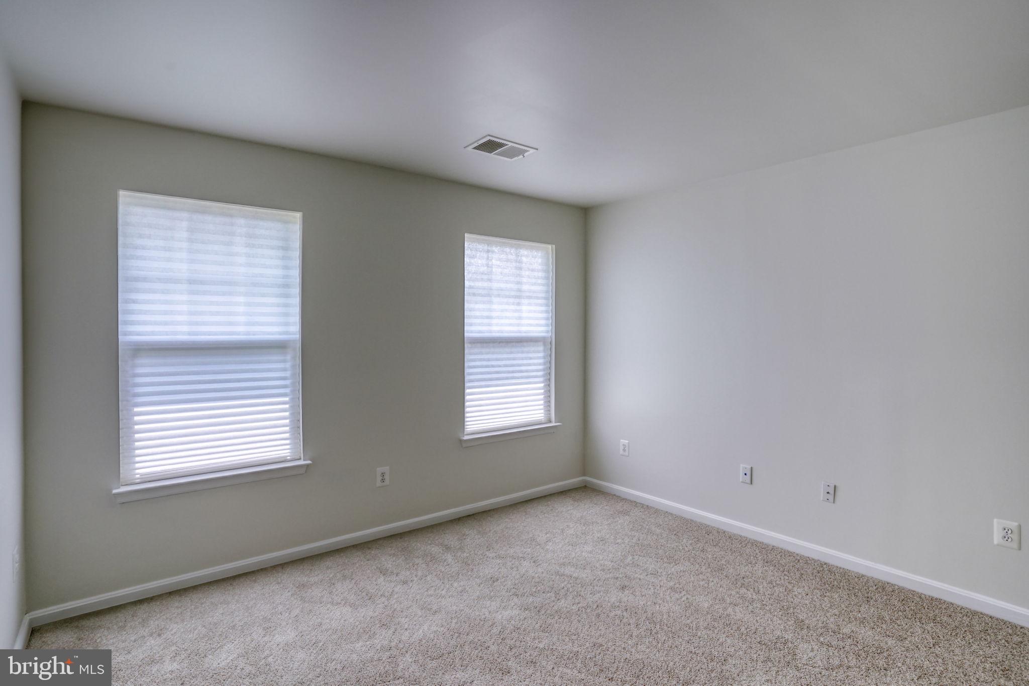 305 Appleby School Road Cambridge, MD 21613 - Photo 39 of 53 a view of an empty room with a window