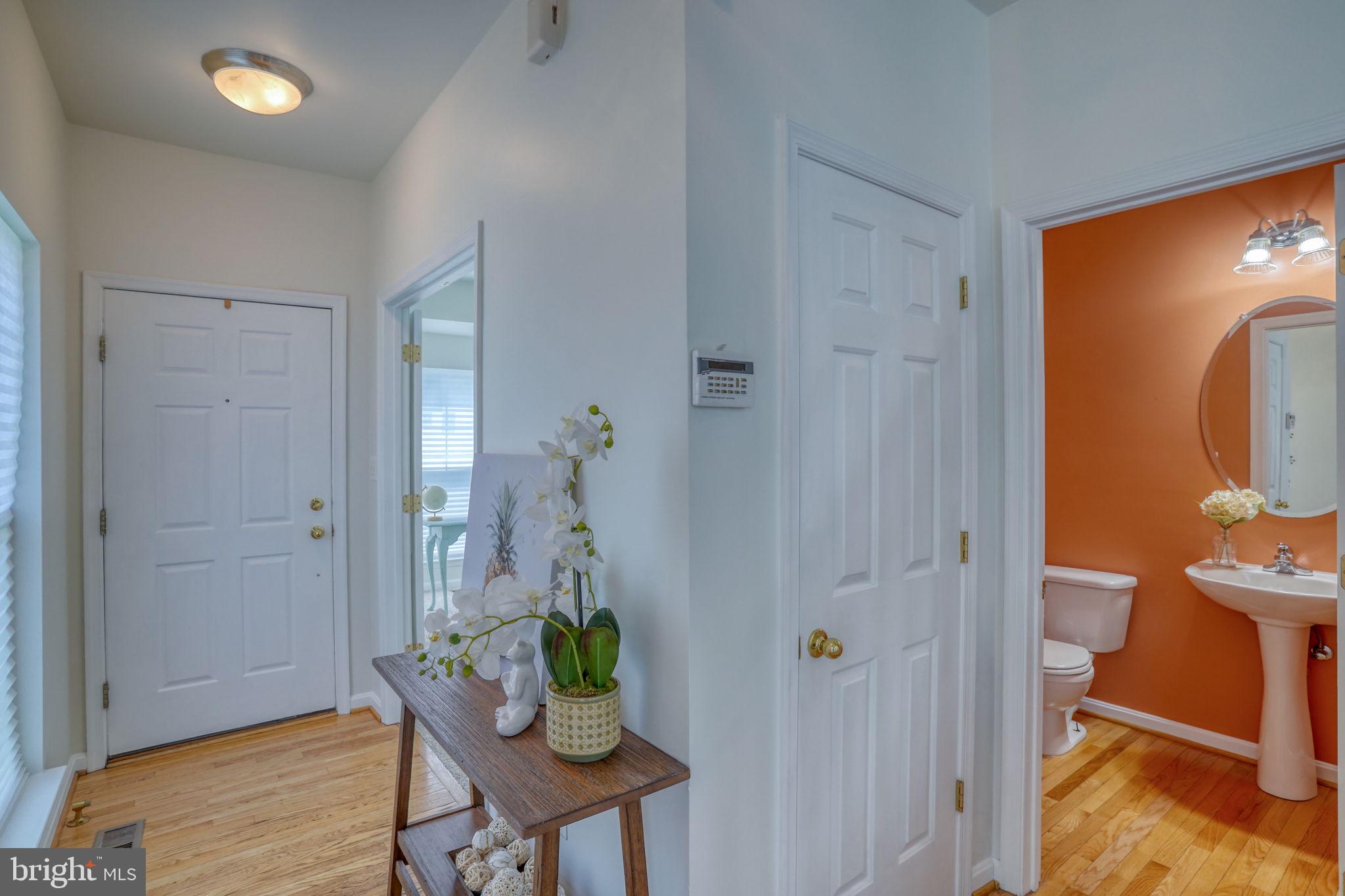 305 Appleby School Road Cambridge, MD 21613 - Photo 7 of 53 a view of dining room and wooden floor