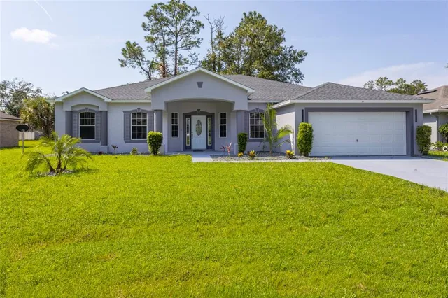 $385,000 | 57 Renshaw Drive, Palm Coast, FL 32164