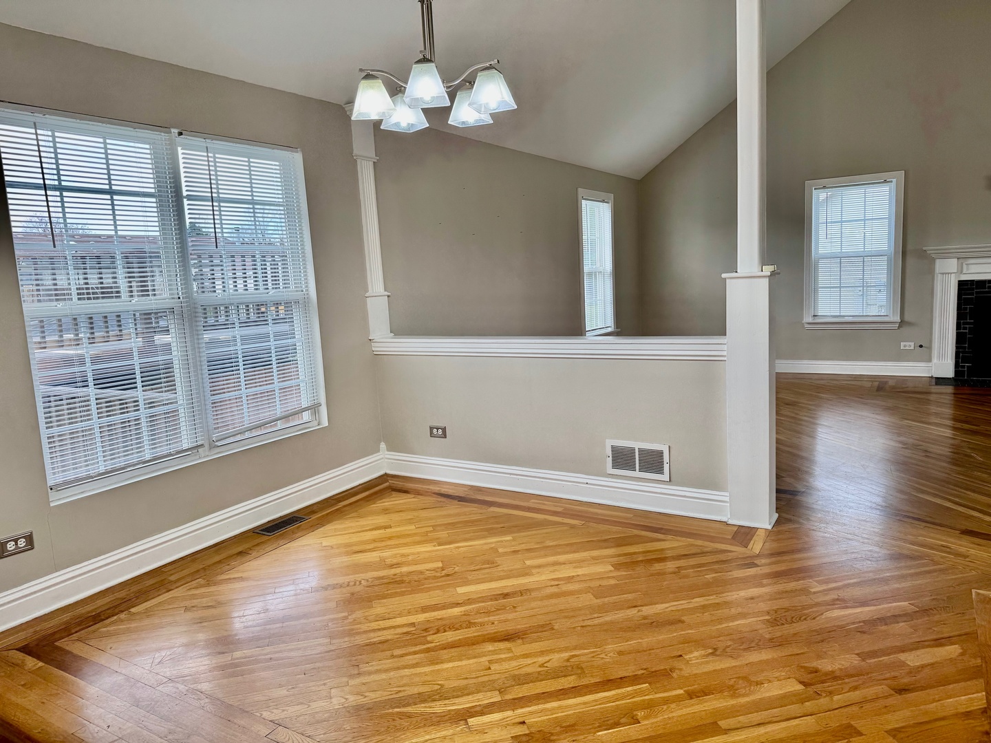 516 Chestnut Lane Peotone, IL 60468 - Photo 11 of 27 a view of an empty room with wooden floor and a window