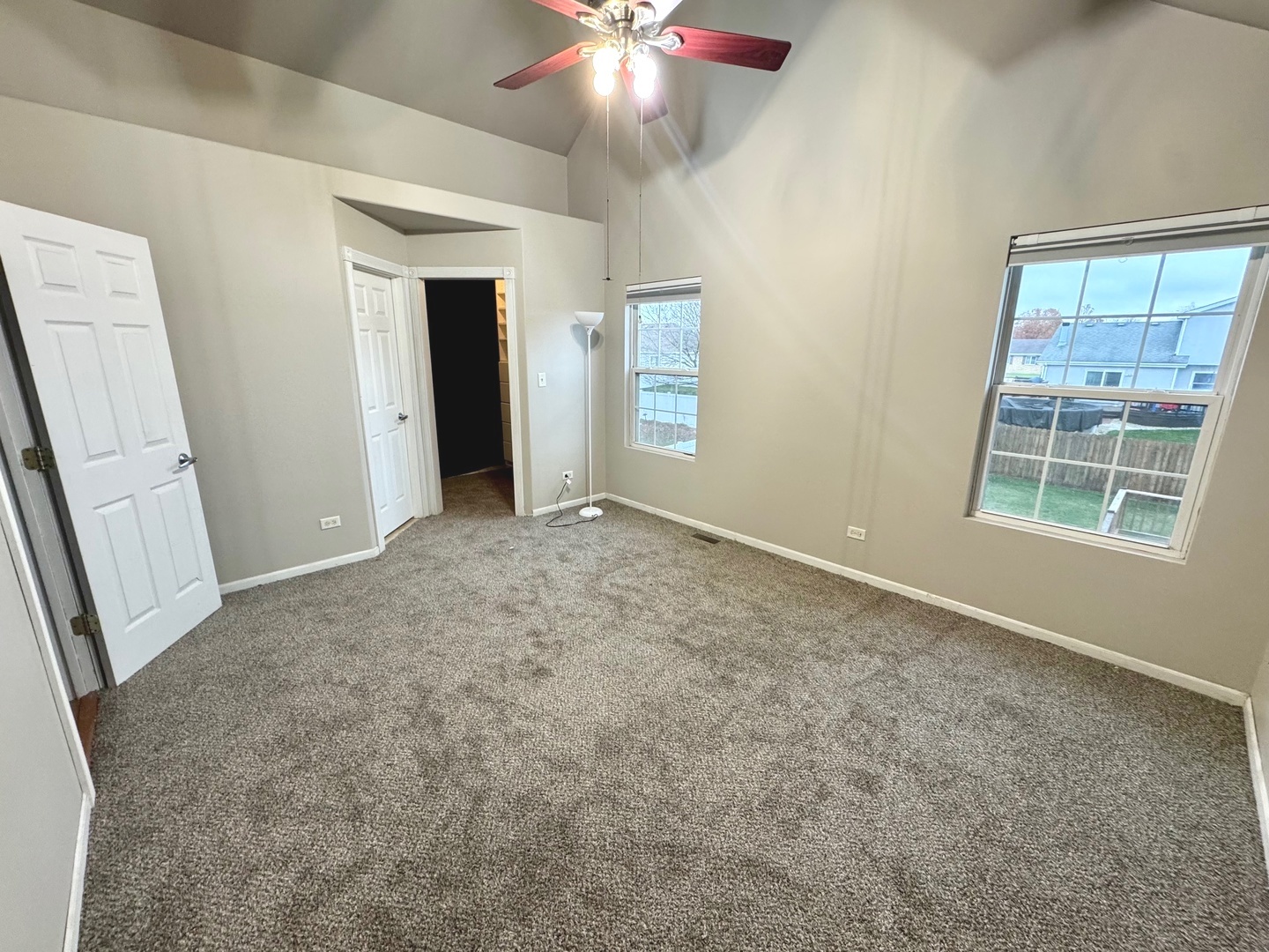 516 Chestnut Lane Peotone, IL 60468 - Photo 15 of 27 an empty room with windows and cabinet