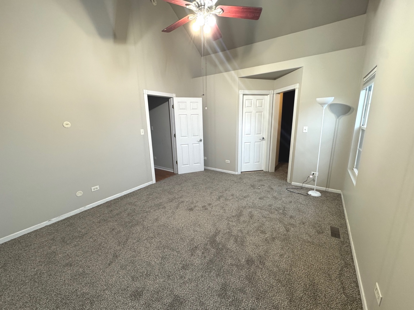 516 Chestnut Lane Peotone, IL 60468 - Photo 16 of 27 a view of an empty room and chandelier fan