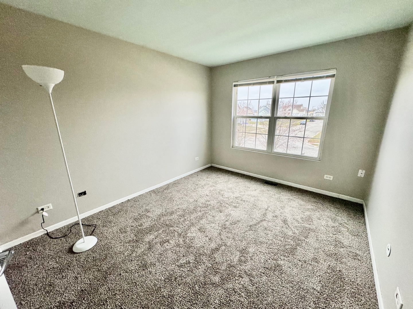 516 Chestnut Lane Peotone, IL 60468 - Photo 20 of 27 a view of an empty room with a window