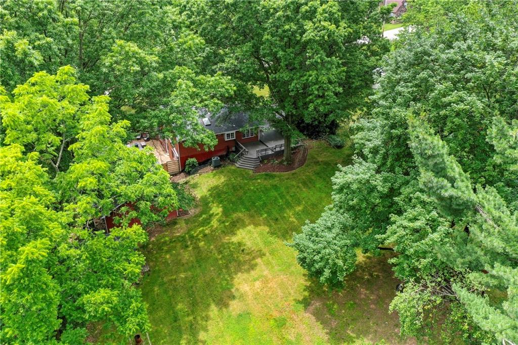 200 Inwood Road Pittsburgh, PA 15237 - Photo 5 of 37 a backyard of a house with lots of green space and a tree