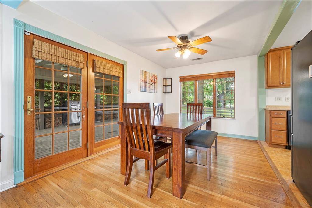200 Inwood Road Pittsburgh, PA 15237 - Photo 9 of 37 a view of a dining room with furniture a chandelier and wooden floor