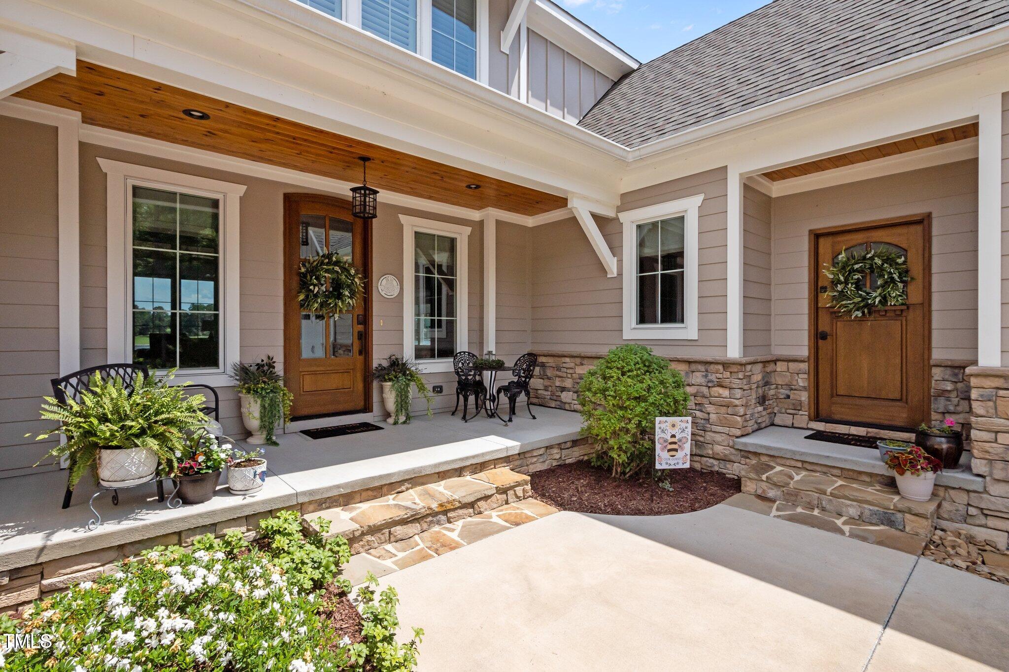 976 Estate Road Semora, NC 27343 - Photo 12 of 74 a front view of house with outdoor seating