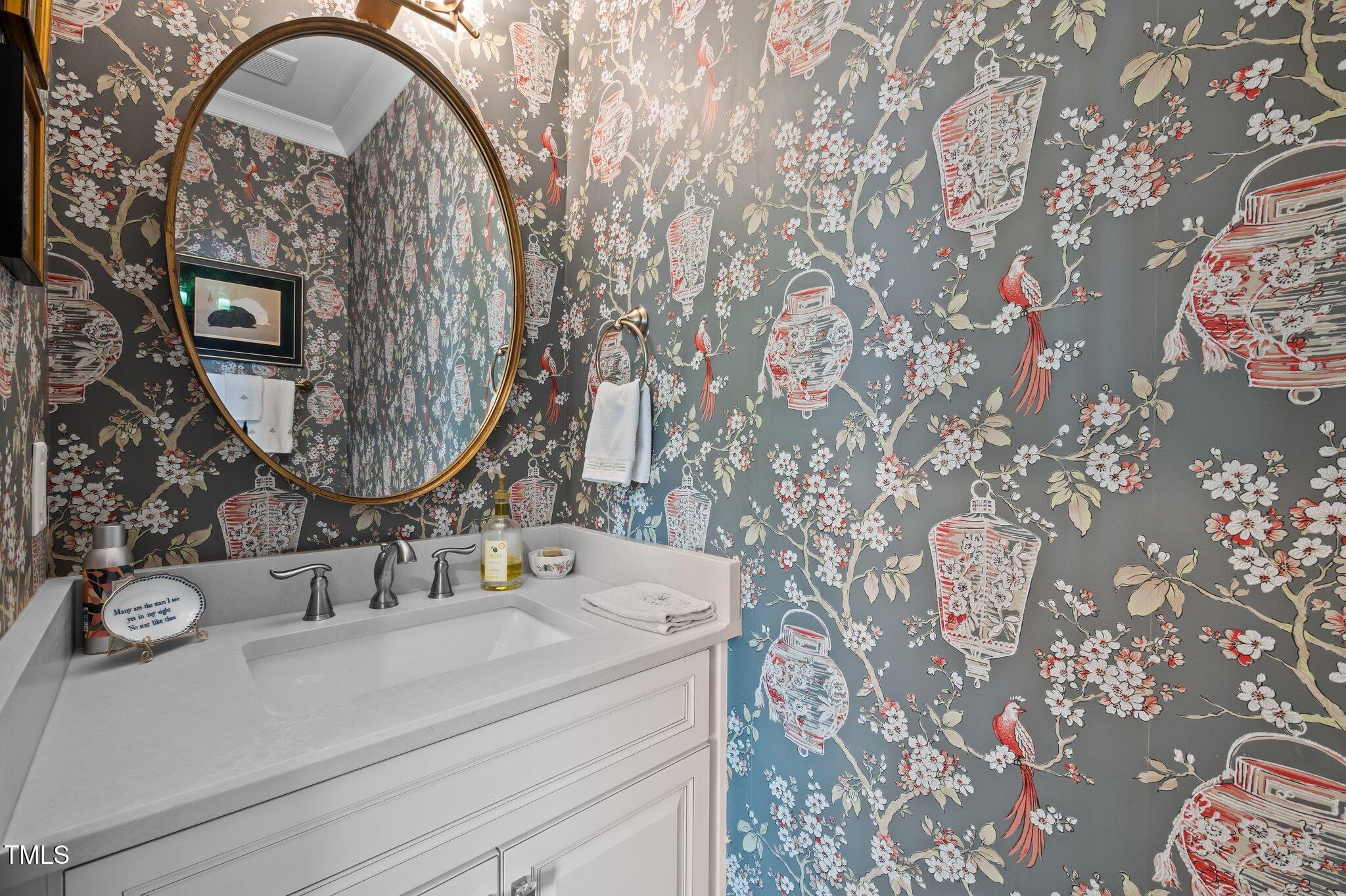 976 Estate Road Semora, NC 27343 - Photo 28 of 74 a bathroom with a sink and mirror with painted walls