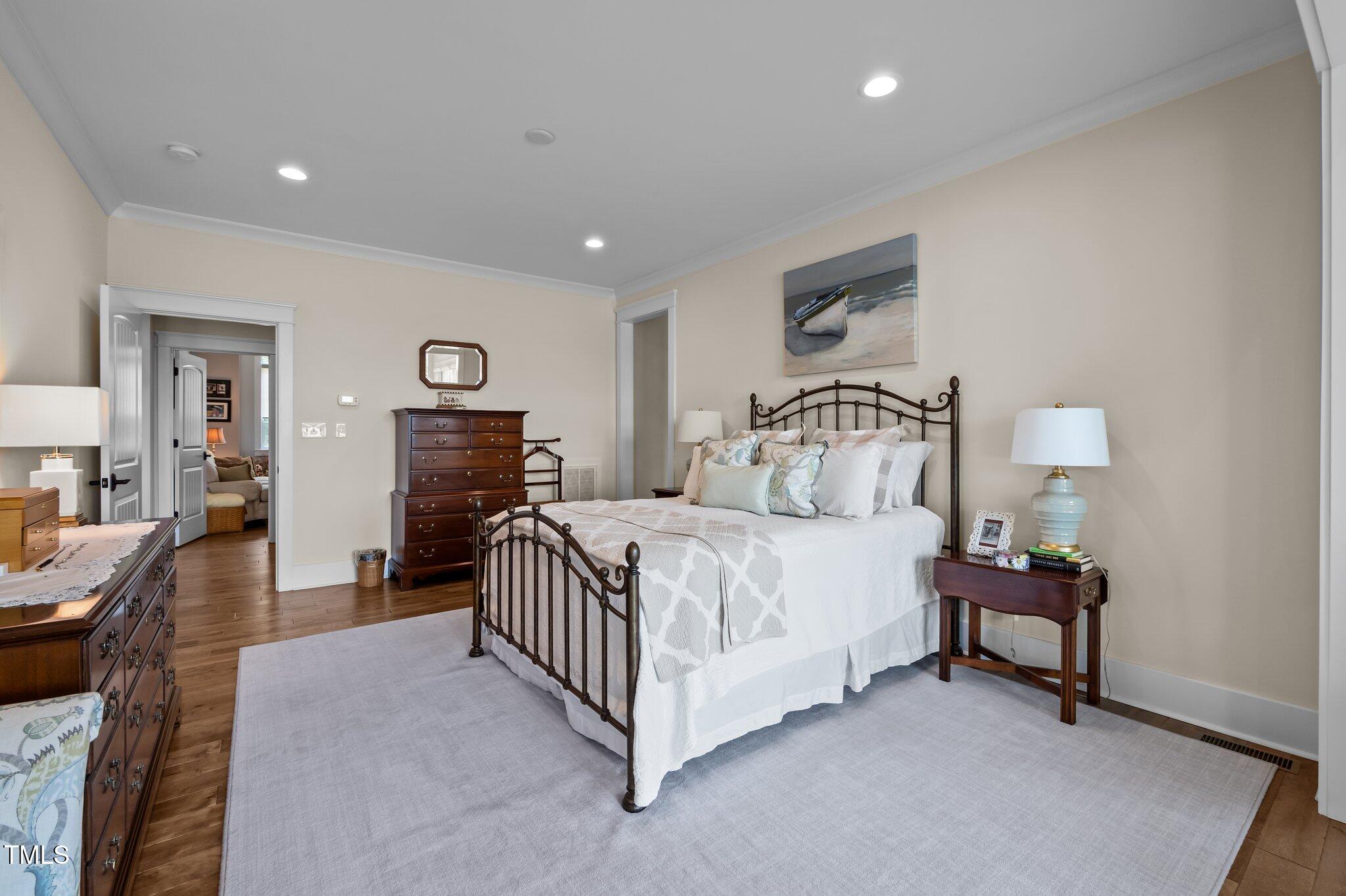 976 Estate Road Semora, NC 27343 - Photo 32 of 74 a bedroom with a bed and lamp