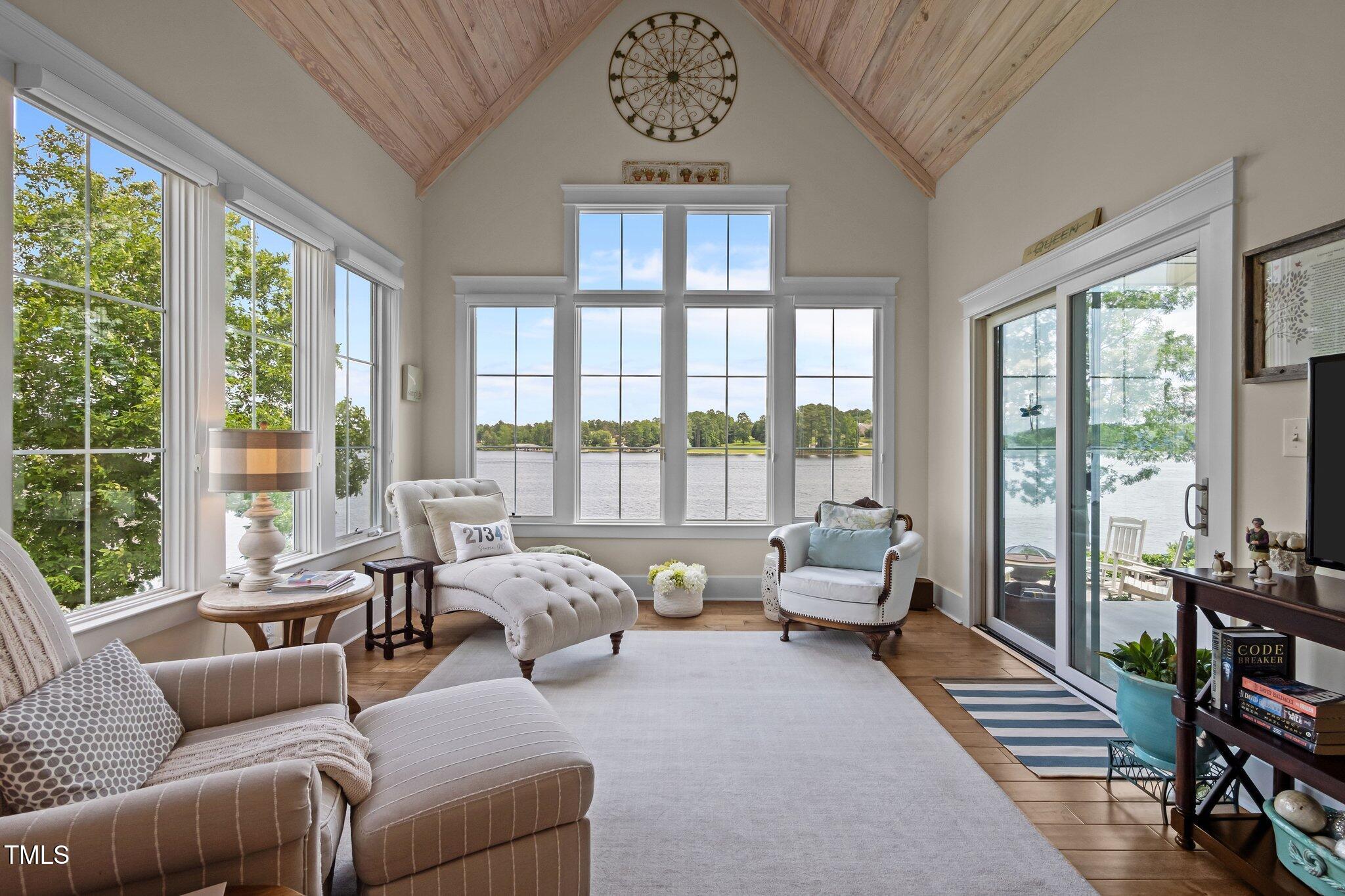 976 Estate Road Semora, NC 27343 - Photo 33 of 74 a living room with furniture and a large window