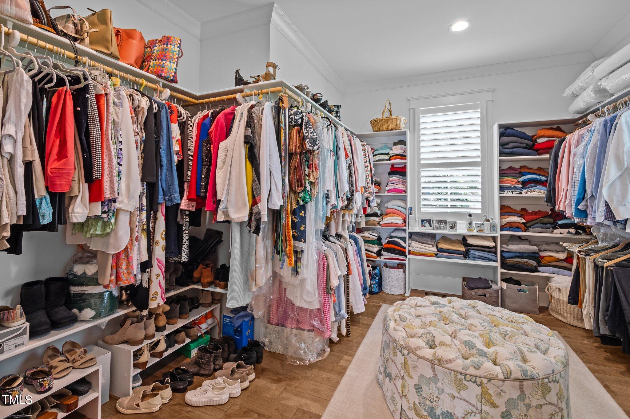 976 Estate Road Semora, NC 27343 - Photo 36 of 74 a view of walk in closet with clothes and shoes
