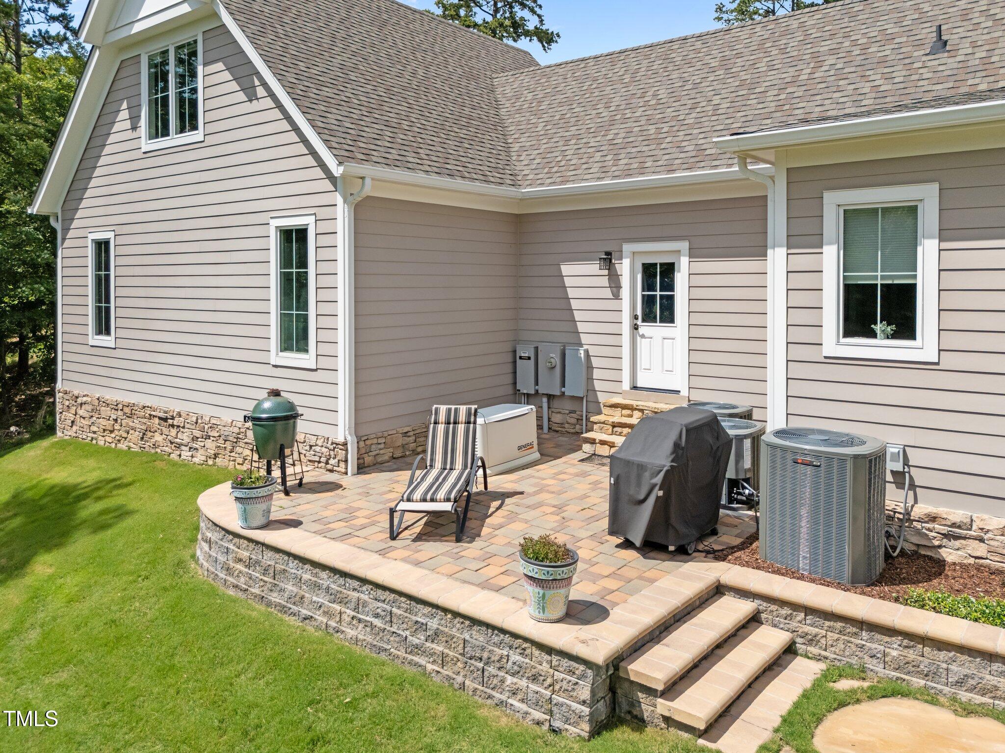 976 Estate Road Semora, NC 27343 - Photo 51 of 74 a view of a house with backyard and sitting area