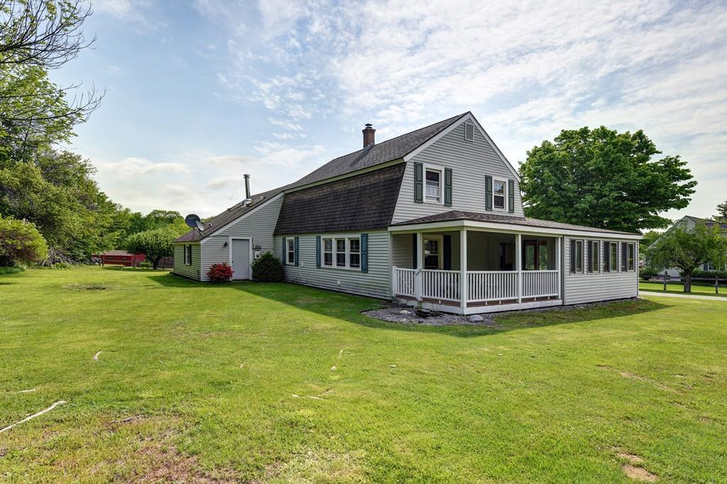 440 Huntington Road Worthington, MA 01098 - Photo 1 of 34 a front view of a house with a garden