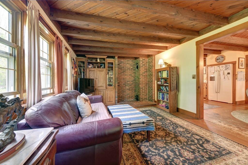 440 Huntington Road Worthington, MA 01098 - Photo 11 of 34 a living room with furniture and a rug