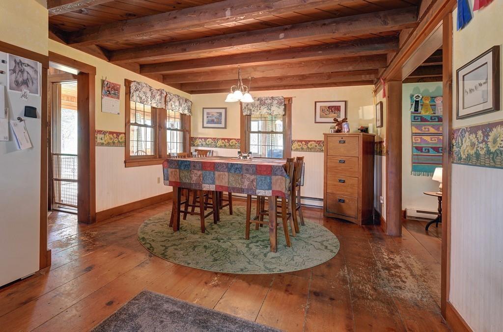 440 Huntington Road Worthington, MA 01098 - Photo 13 of 34 a view of a dining room with furniture window and wooden floor
