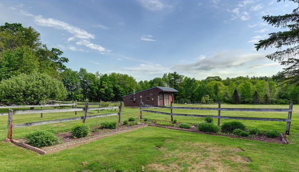 440 Huntington Road Worthington, MA 01098 - Photo 29 of 34 a view of a big house in a big yard with a big trees
