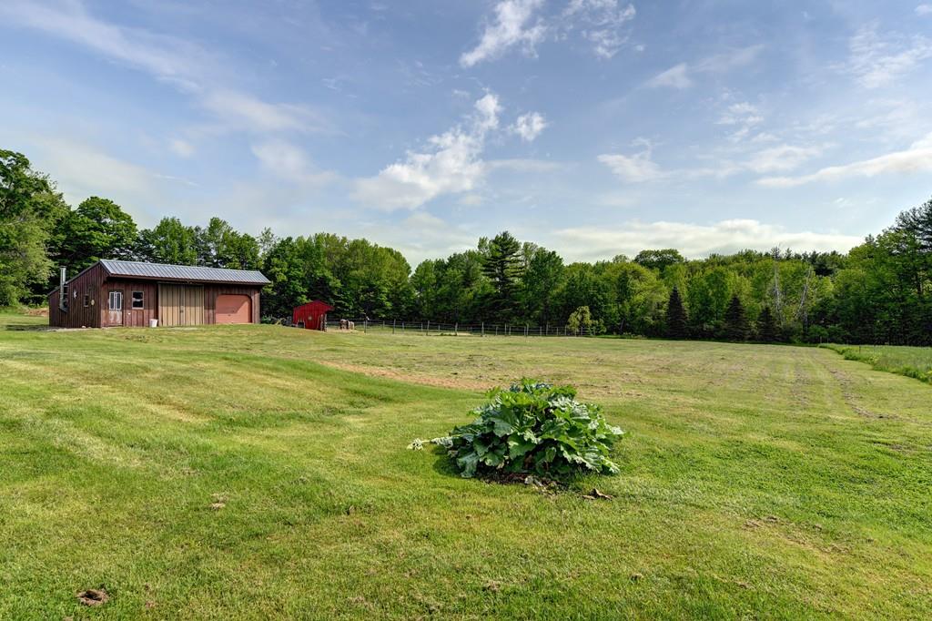 440 Huntington Road Worthington, MA 01098 - Photo 30 of 34 a view of a house with a yard