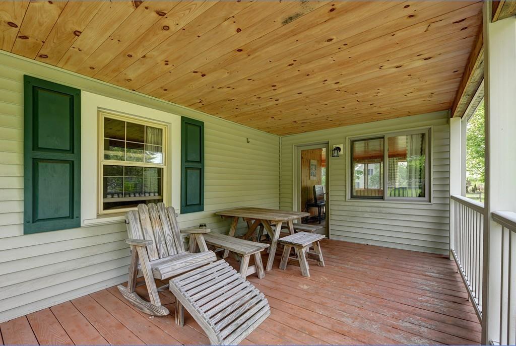 440 Huntington Road Worthington, MA 01098 - Photo 3 of 34 a balcony with furniture and wooden floor