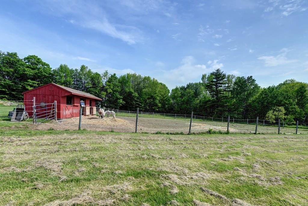 440 Huntington Road Worthington, MA 01098 - Photo 32 of 34 a backyard of a house with lots of green space