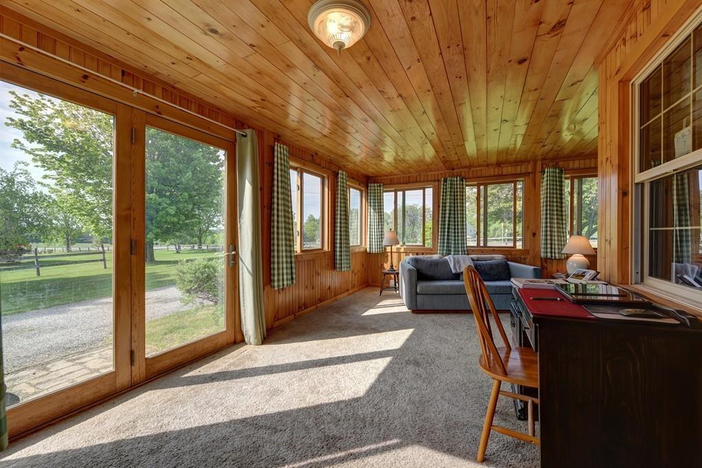 440 Huntington Road Worthington, MA 01098 - Photo 6 of 34 a living room with furniture and large windows