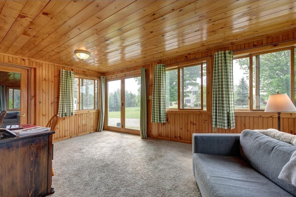 440 Huntington Road Worthington, MA 01098 - Photo 7 of 34 a bedroom with furniture and large windows