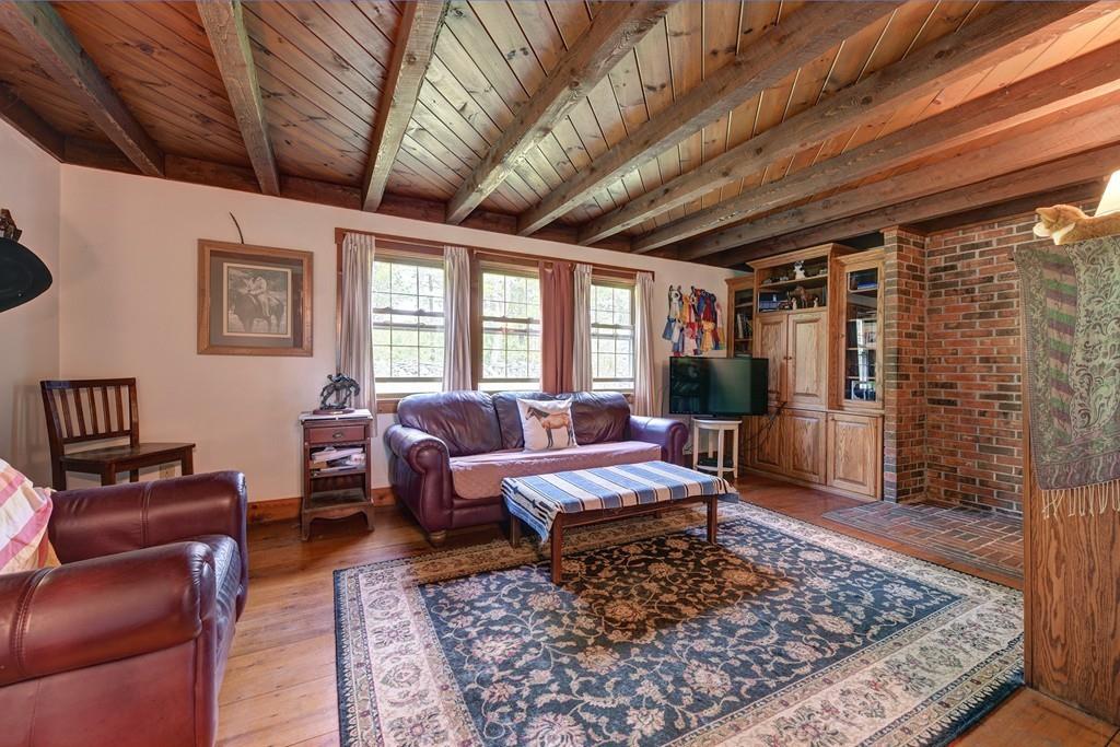 440 Huntington Road Worthington, MA 01098 - Photo 8 of 34 a living room with furniture and a rug