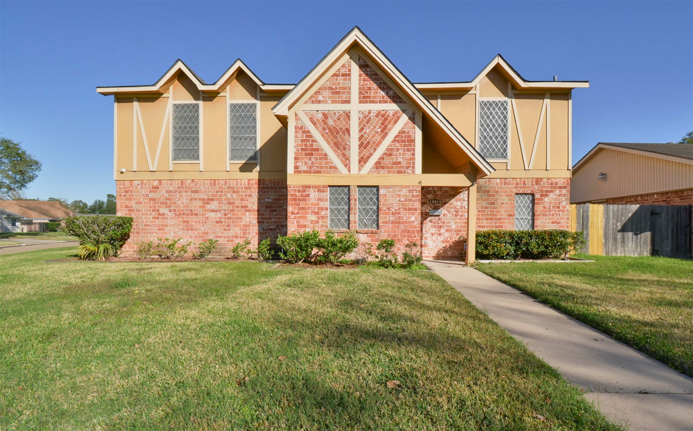 13915 Roundstone Lane Houston, TX 77015 - Photo 1 of 42 a view of a house with a yard and garage