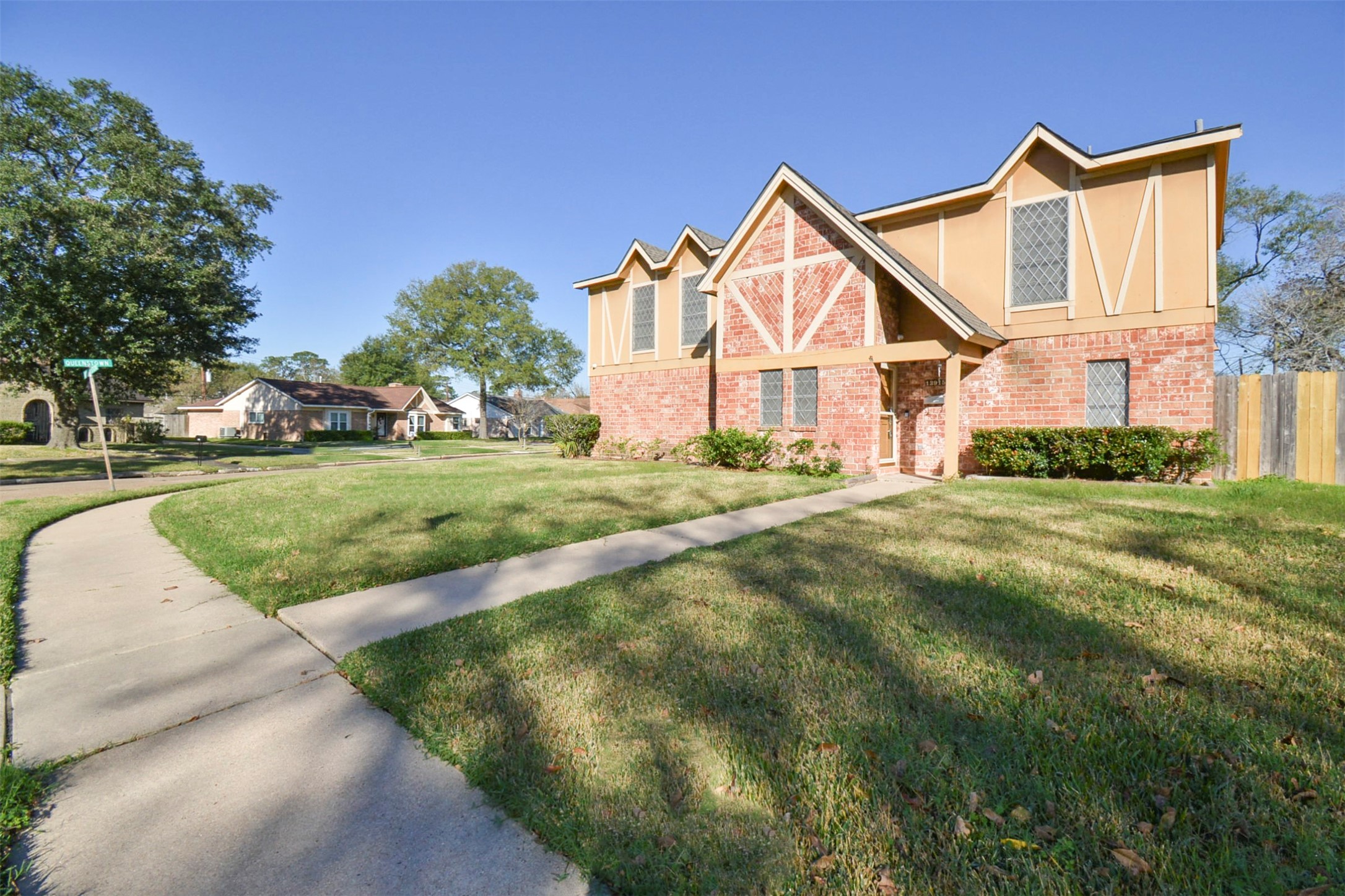 13915 Roundstone Lane Houston, TX 77015 - Photo 2 of 42 a view of a house with a big yard and potted plants