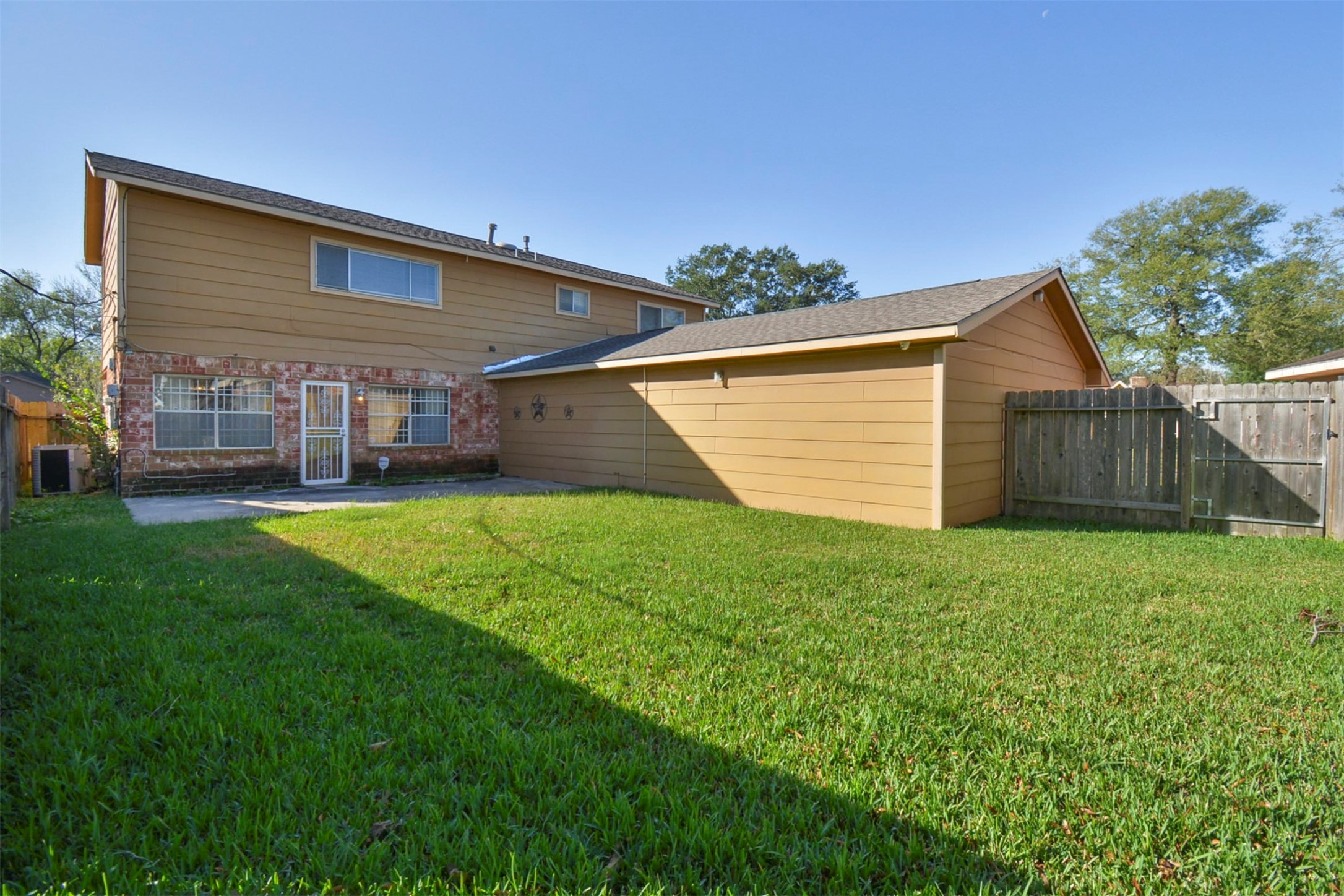13915 Roundstone Lane Houston, TX 77015 - Photo 42 of 42 a view of a house with a backyard