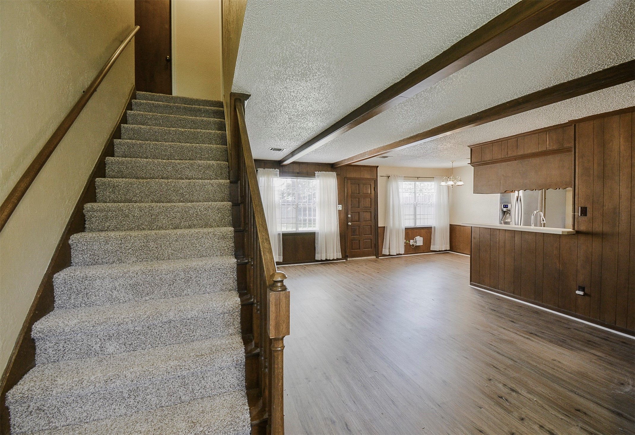 13915 Roundstone Lane Houston, TX 77015 - Photo 5 of 42 a view of entryway and hall with wooden floor