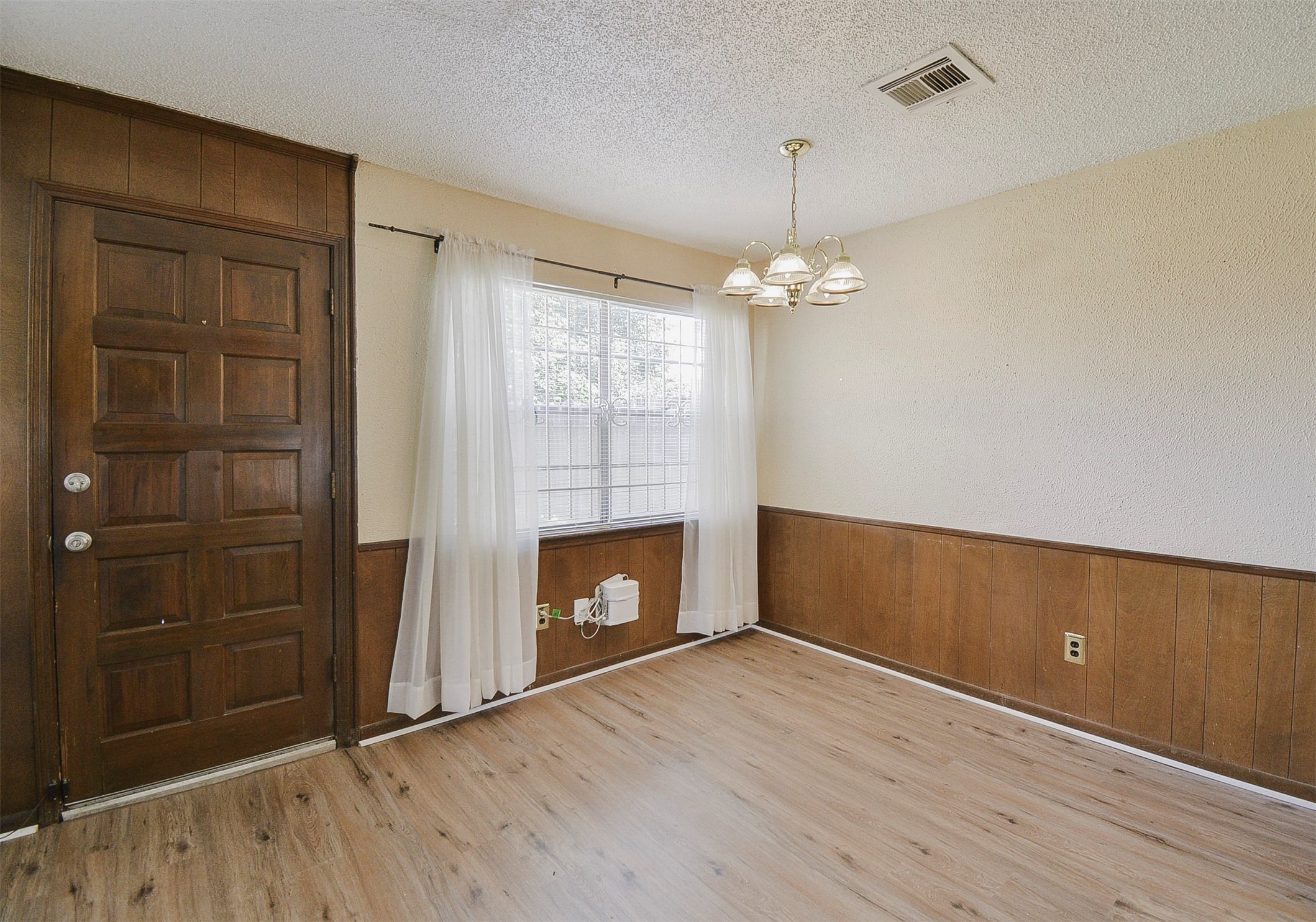 13915 Roundstone Lane Houston, TX 77015 - Photo 9 of 42 wooden floor in an empty room with a fireplace