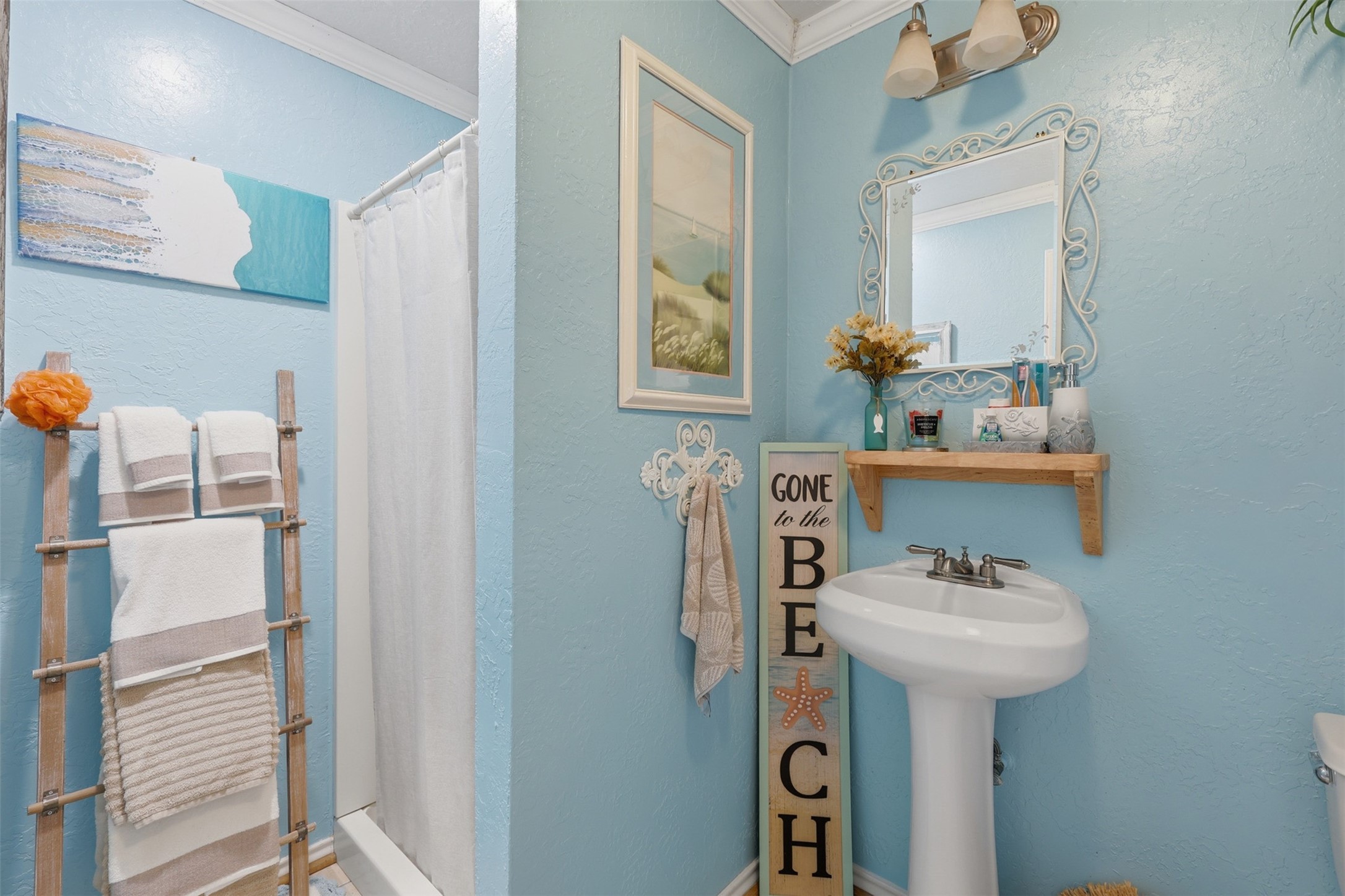 7010 River Mill Drive Spring, TX 77379 - Photo 28 of 29 a bathroom with a sink and a mirror