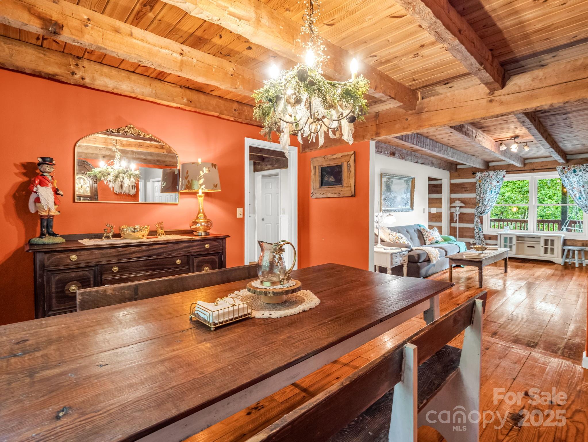 1145 Bearwallow Mountain Road Hendersonville, NC 28792 - Photo 13 of 48 a view of a living room and chandelier