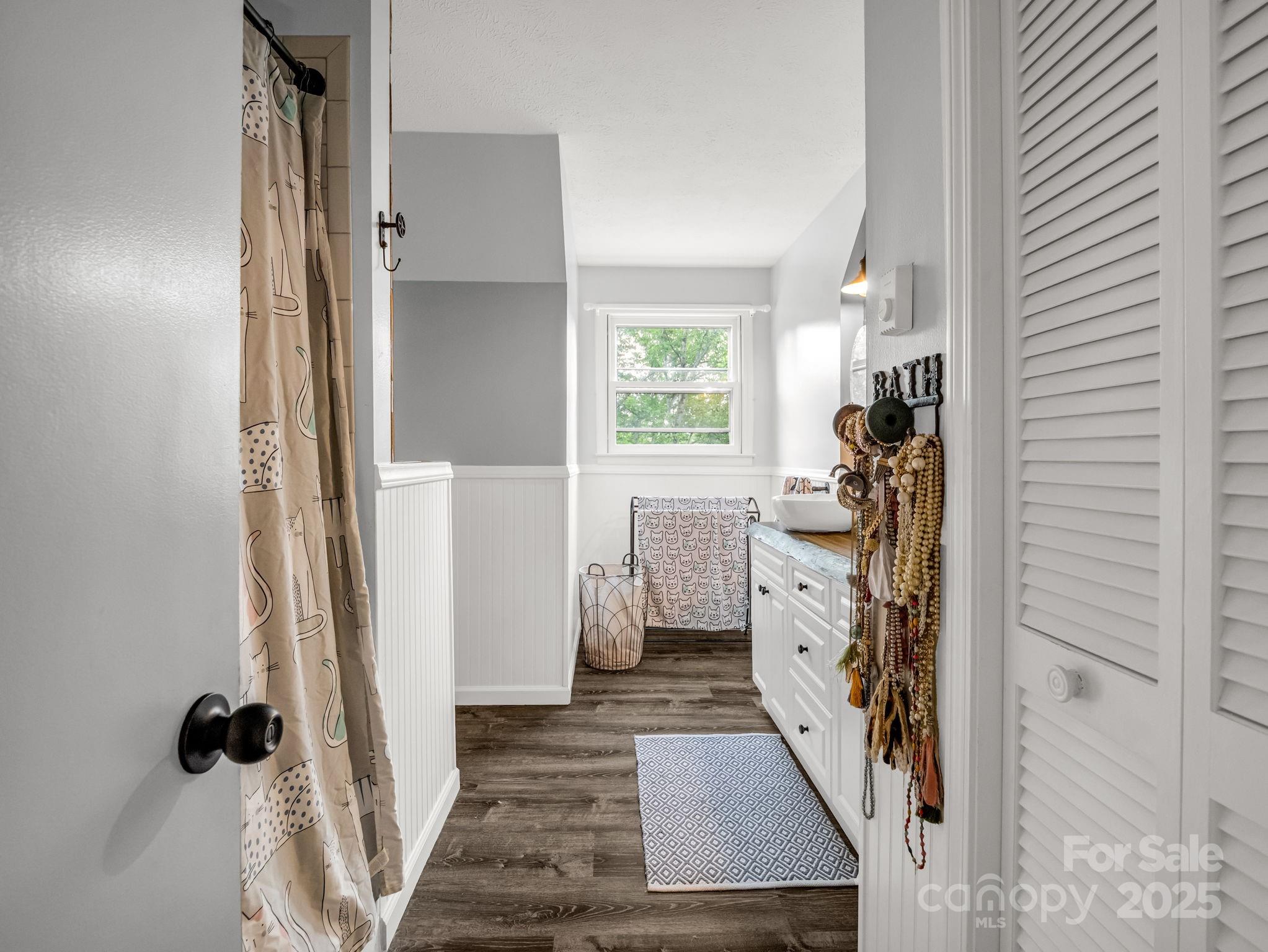 1145 Bearwallow Mountain Road Hendersonville, NC 28792 - Photo 31 of 48 a room with a washer and dryer