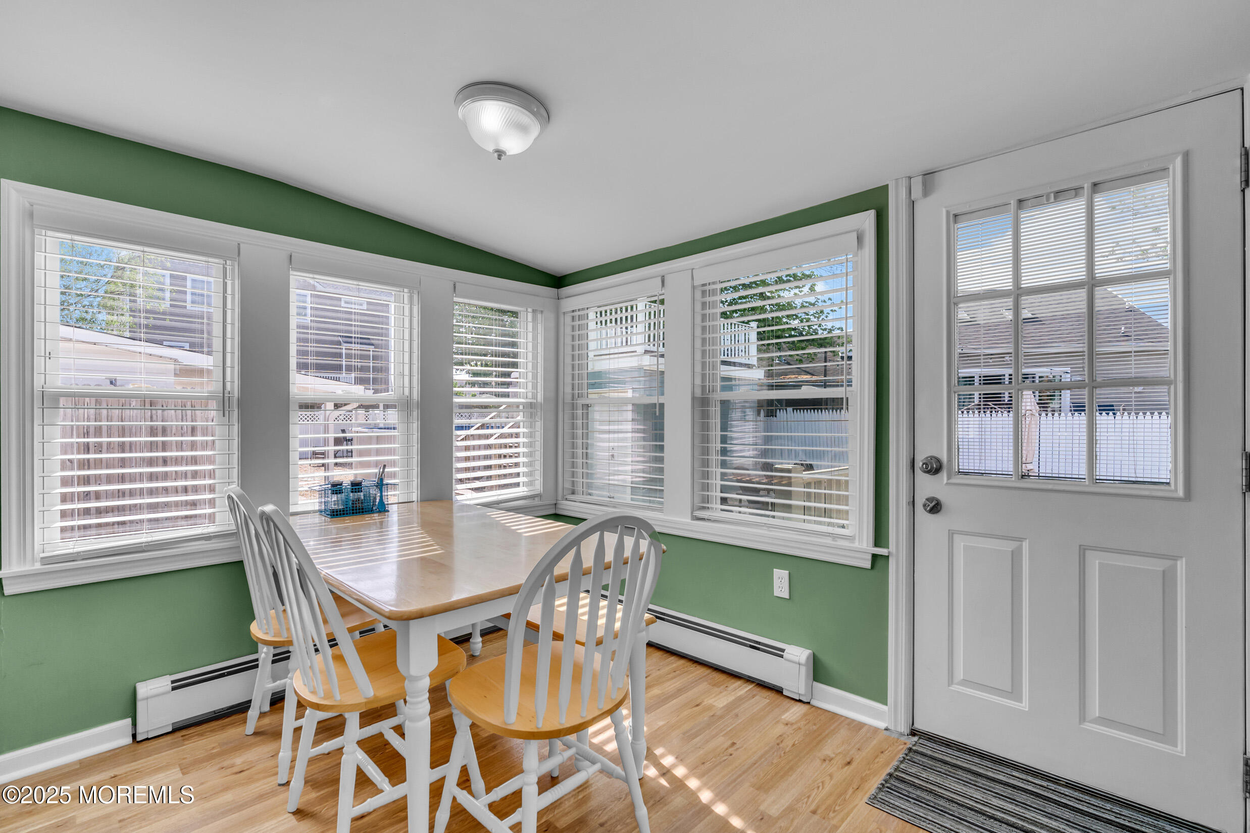 124 Mathis Drive Brick, NJ 08723 - Photo 41 of 45 a view of a dining room with furniture window and outside view