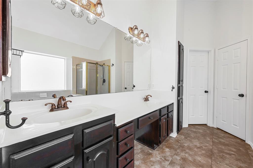 4524 Ridgepointe Drive The Colony, TX 75056 - Photo 15 of 25 a bathroom with a double vanity sink mirror and